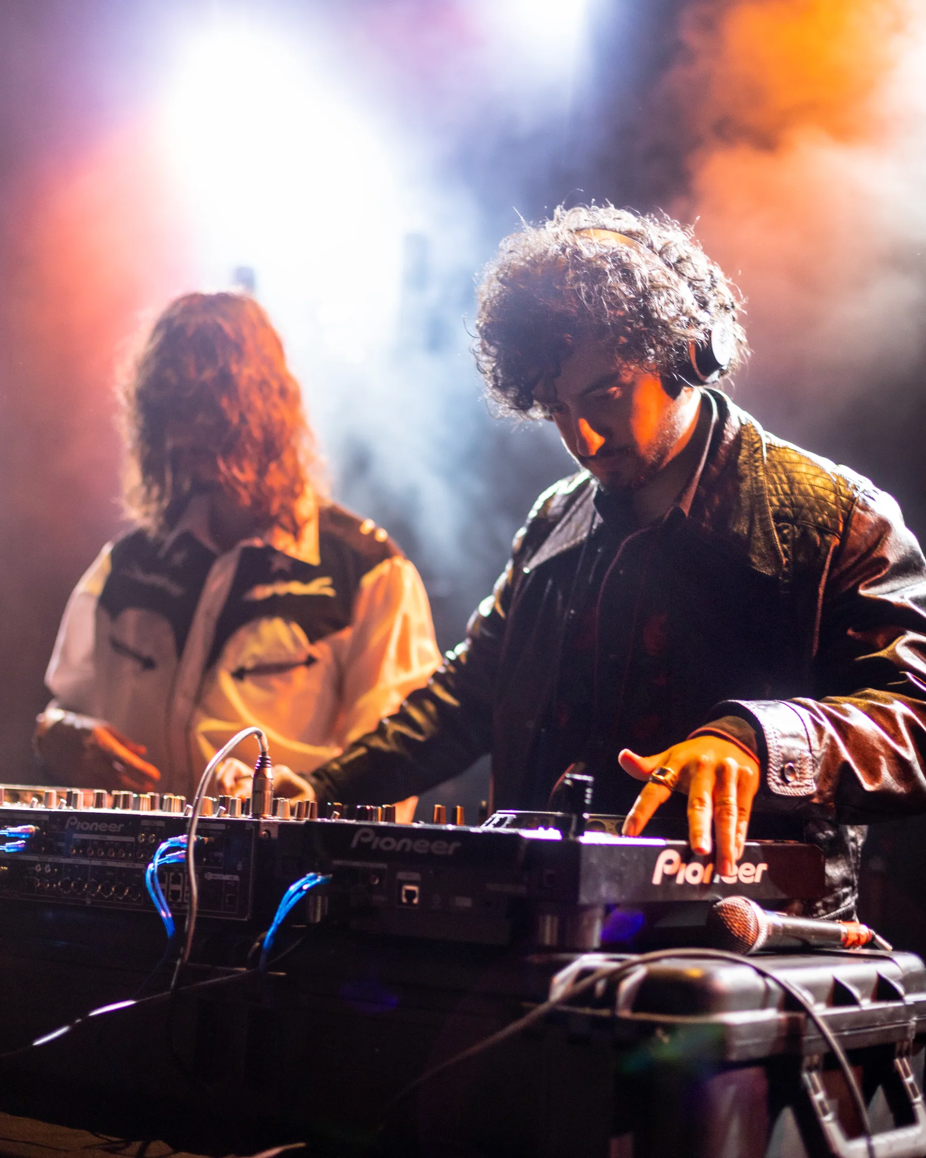 Opening DJ performing before Astronomía Interior at the Lunario del Auditorio Nacional in Mexico City, photographed by Ludovic Delot · frame 1