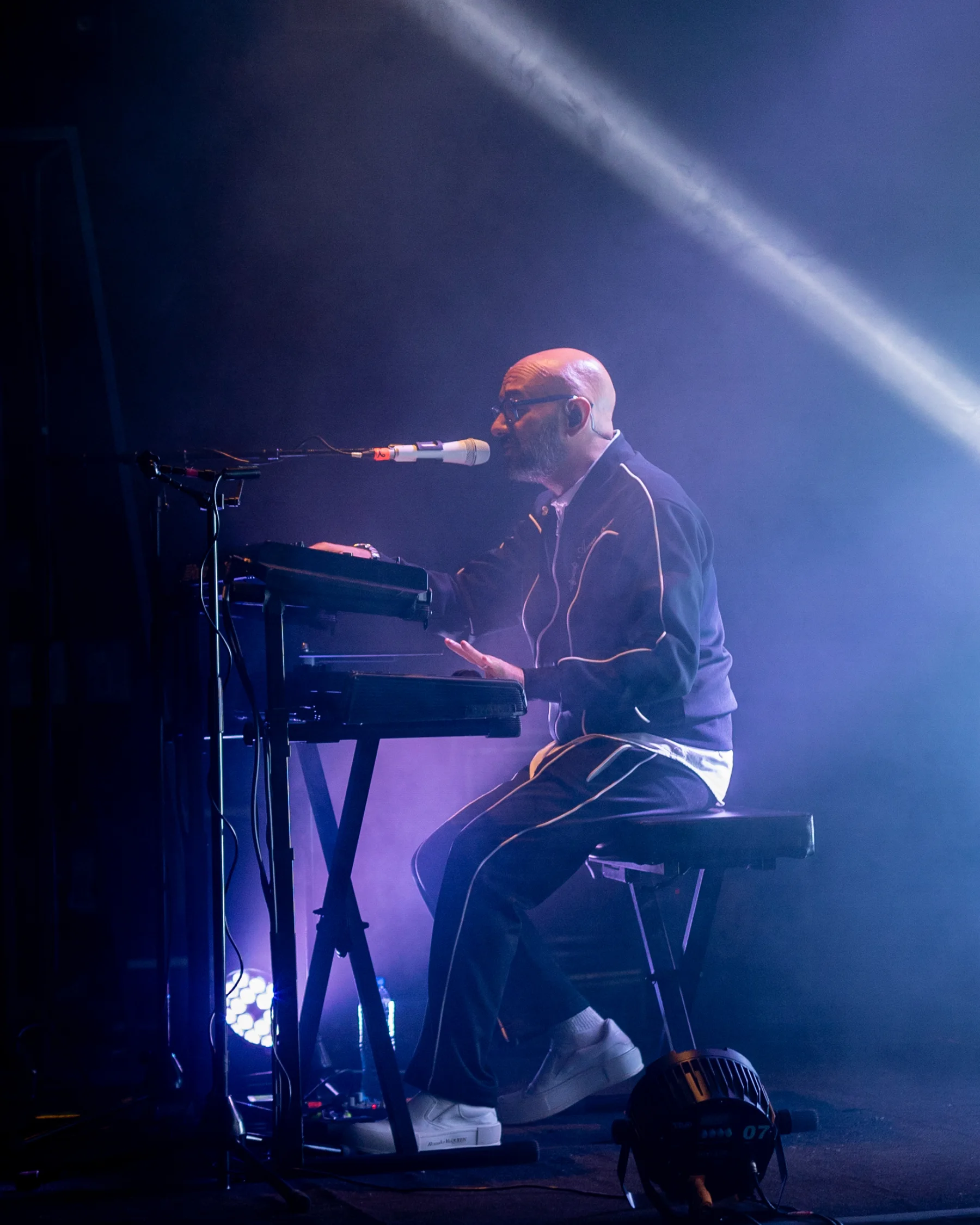 Opening DJ performing before Astronomía Interior at the Lunario del Auditorio Nacional in Mexico City, photographed by Ludovic Delot · frame 11