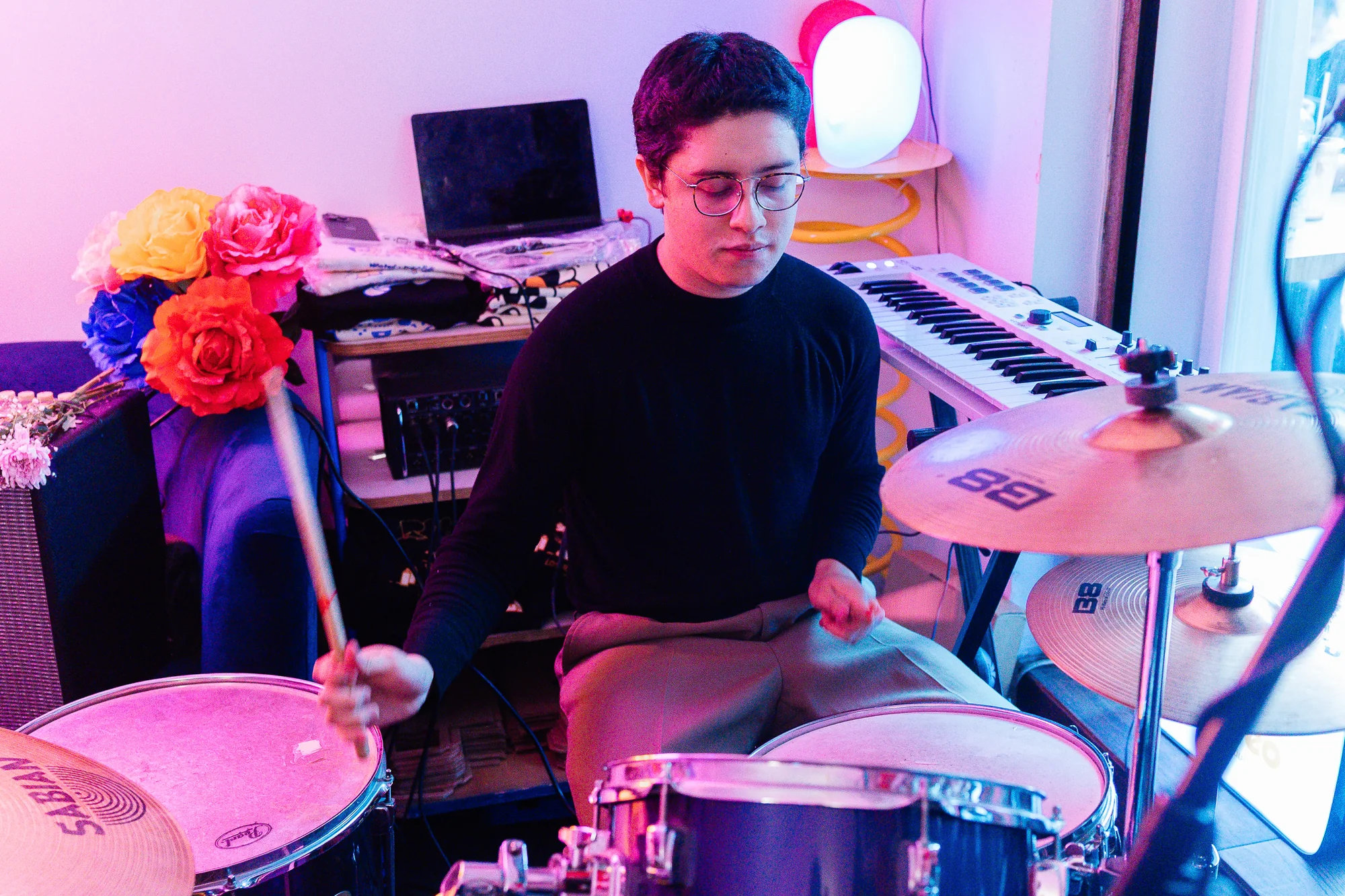 A drummer at the kit, photographed by Ludovic Delot