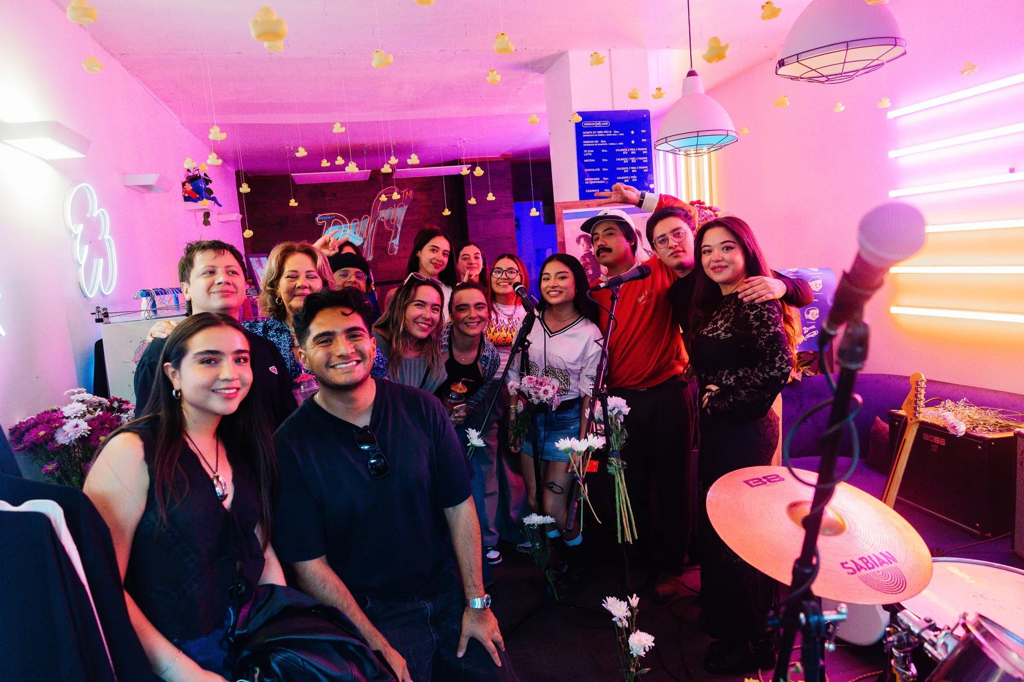 The audience gathered around the band, photographed by Ludovic Delot