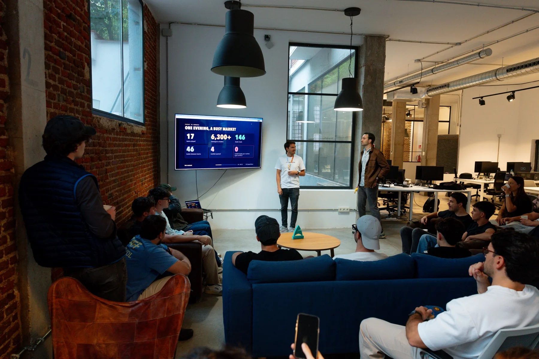 The next session begins at the Claude Community Madrid Hackathon, photographed by Ludovic Delot