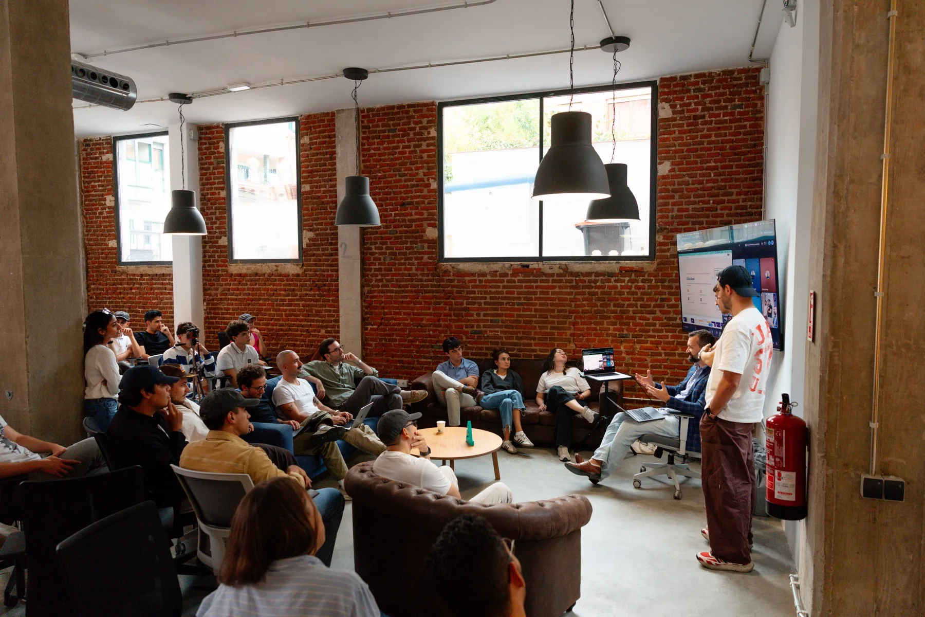 The community, together at the end of the event at the Claude Community Madrid Hackathon, photographed by Ludovic Delot