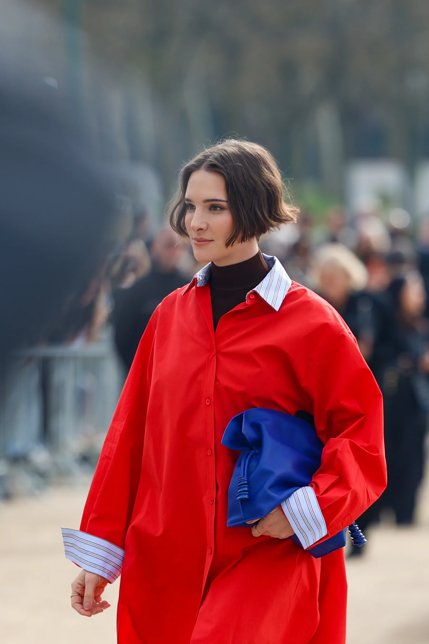 Street-style photograph outside the LOEWE FW26 show during Paris Fashion Week, frame 04 of 34, photographed by Ludovic Delot