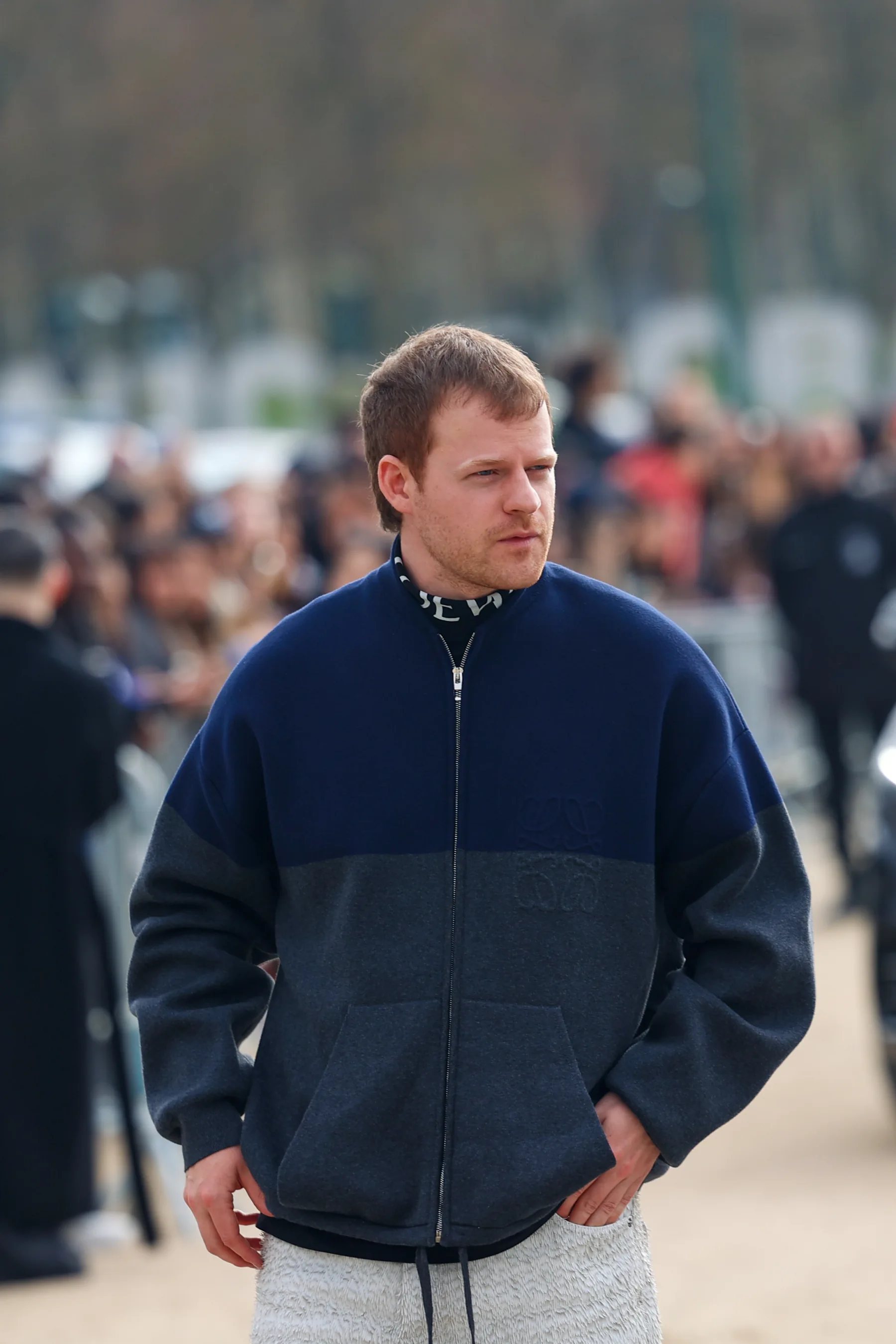 Street-style photograph outside the LOEWE FW26 show during Paris Fashion Week, frame 05 of 34, photographed by Ludovic Delot