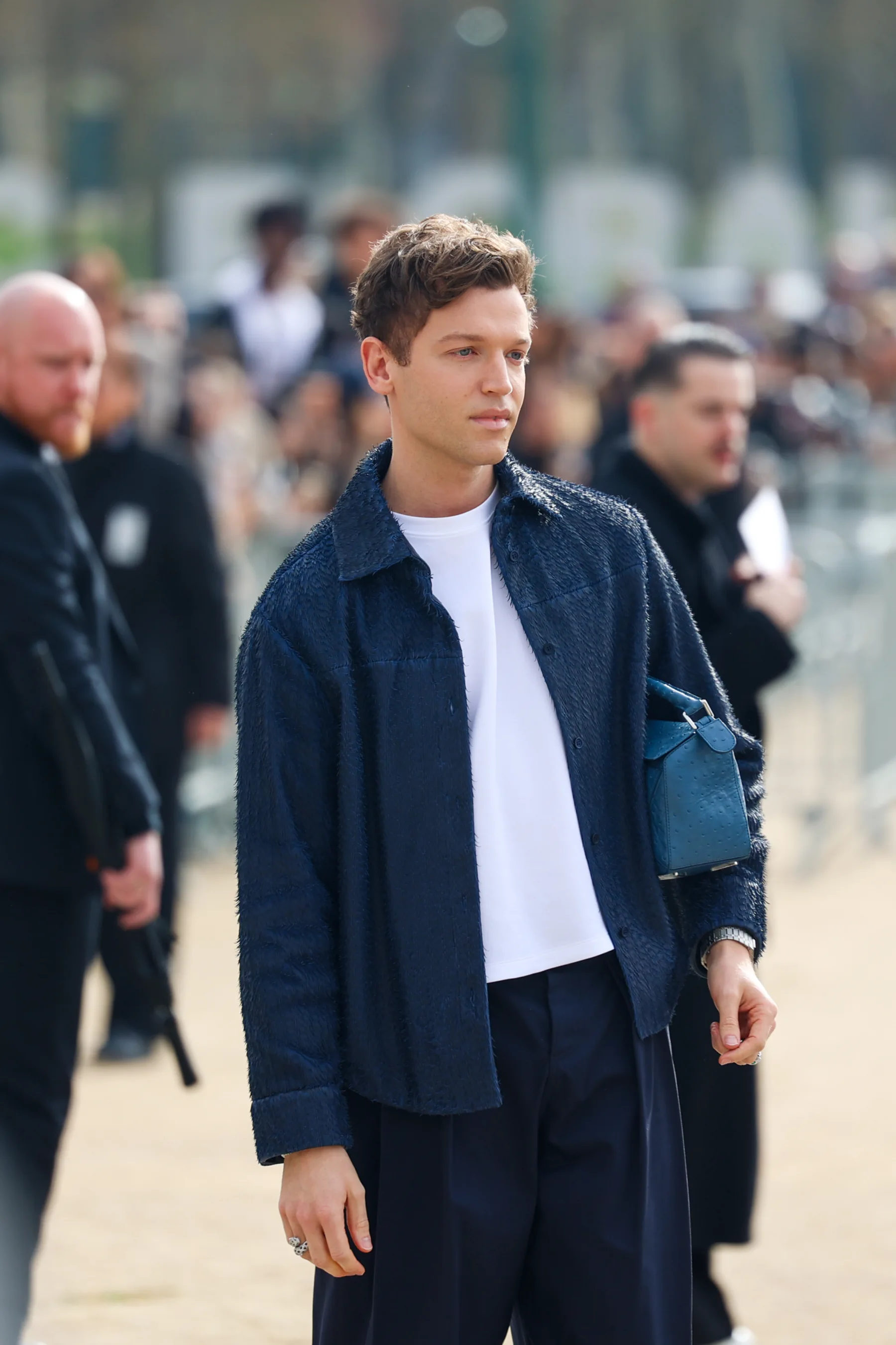 Street-style photograph outside the LOEWE FW26 show during Paris Fashion Week, frame 07 of 34, photographed by Ludovic Delot