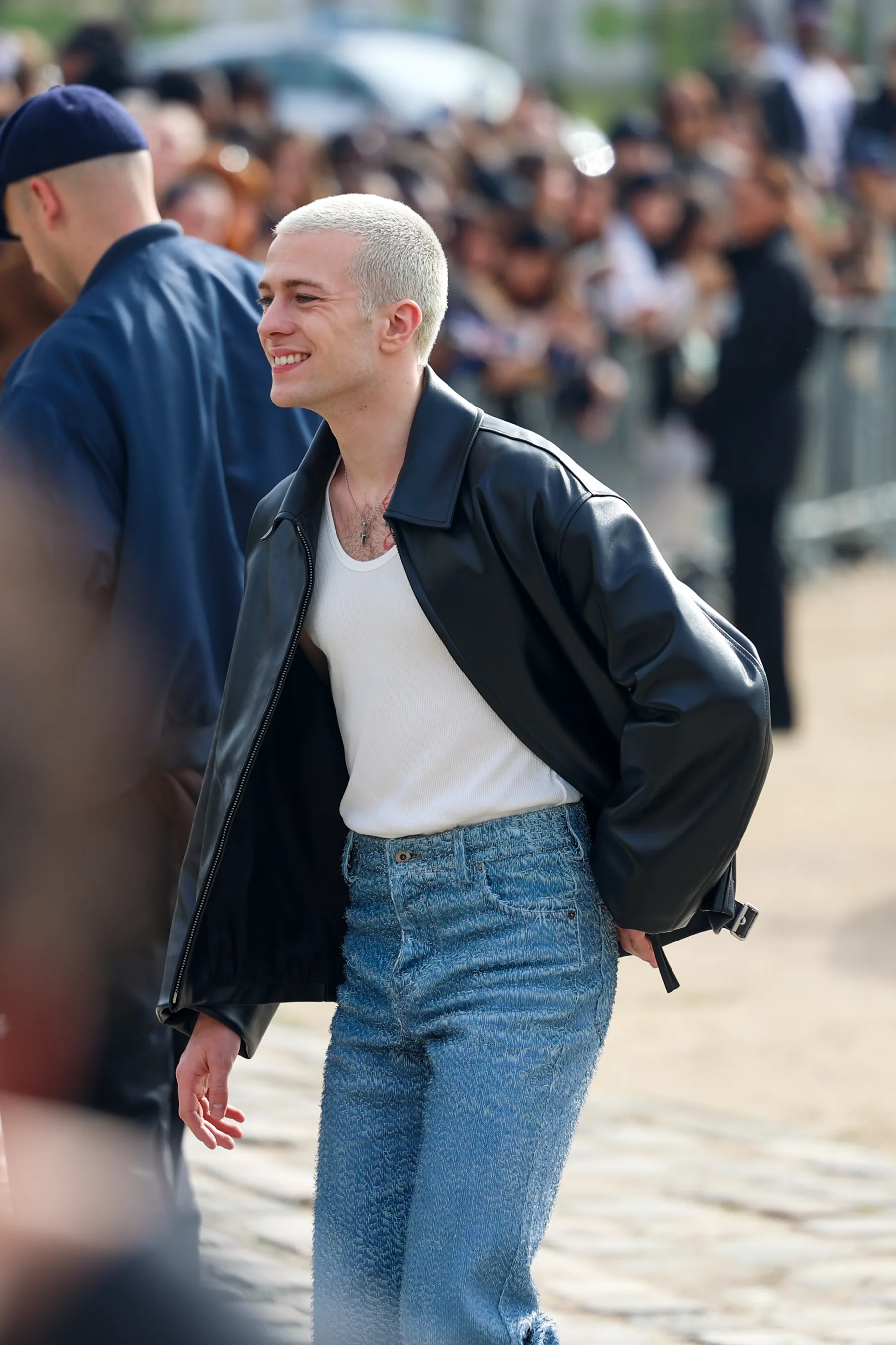 Street-style photograph outside the LOEWE FW26 show during Paris Fashion Week, frame 16 of 34, photographed by Ludovic Delot