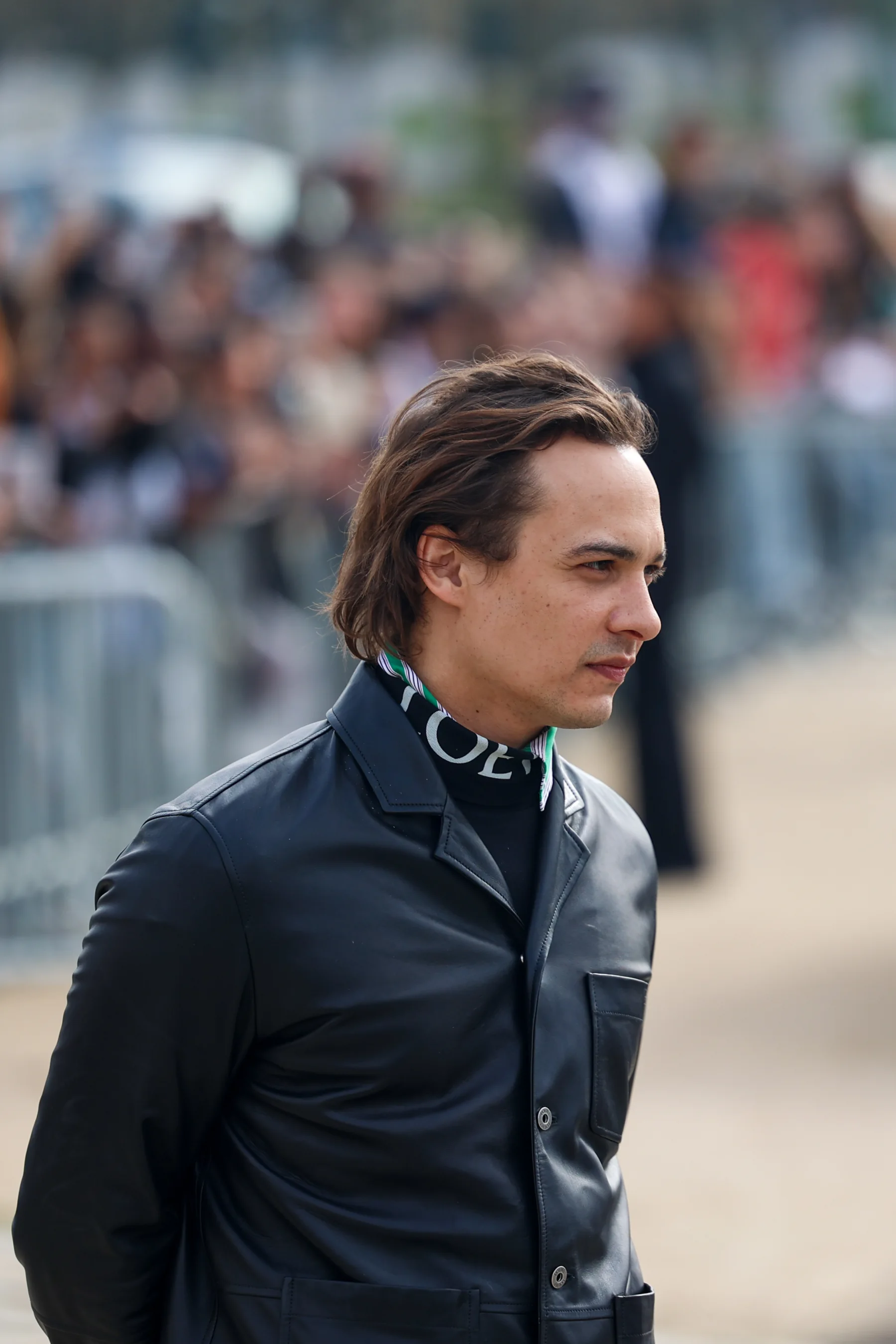 Street-style photograph outside the LOEWE FW26 show during Paris Fashion Week, frame 17 of 34, photographed by Ludovic Delot