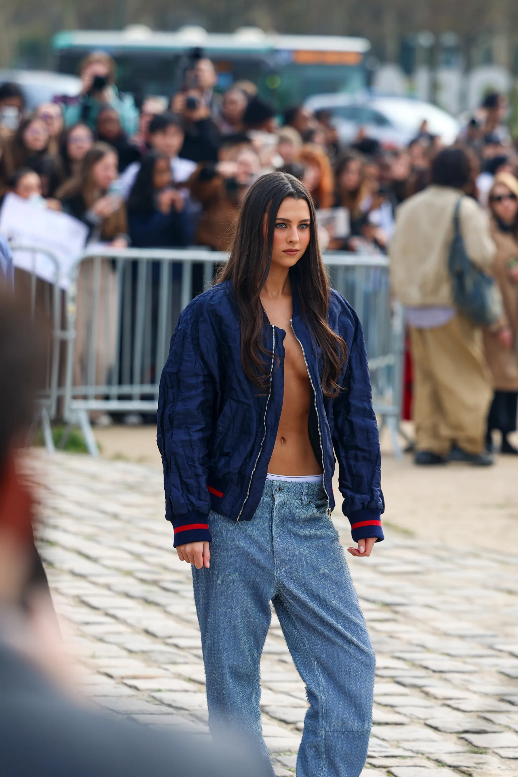 Street-style photograph outside the LOEWE FW26 show during Paris Fashion Week, frame 21 of 34, photographed by Ludovic Delot