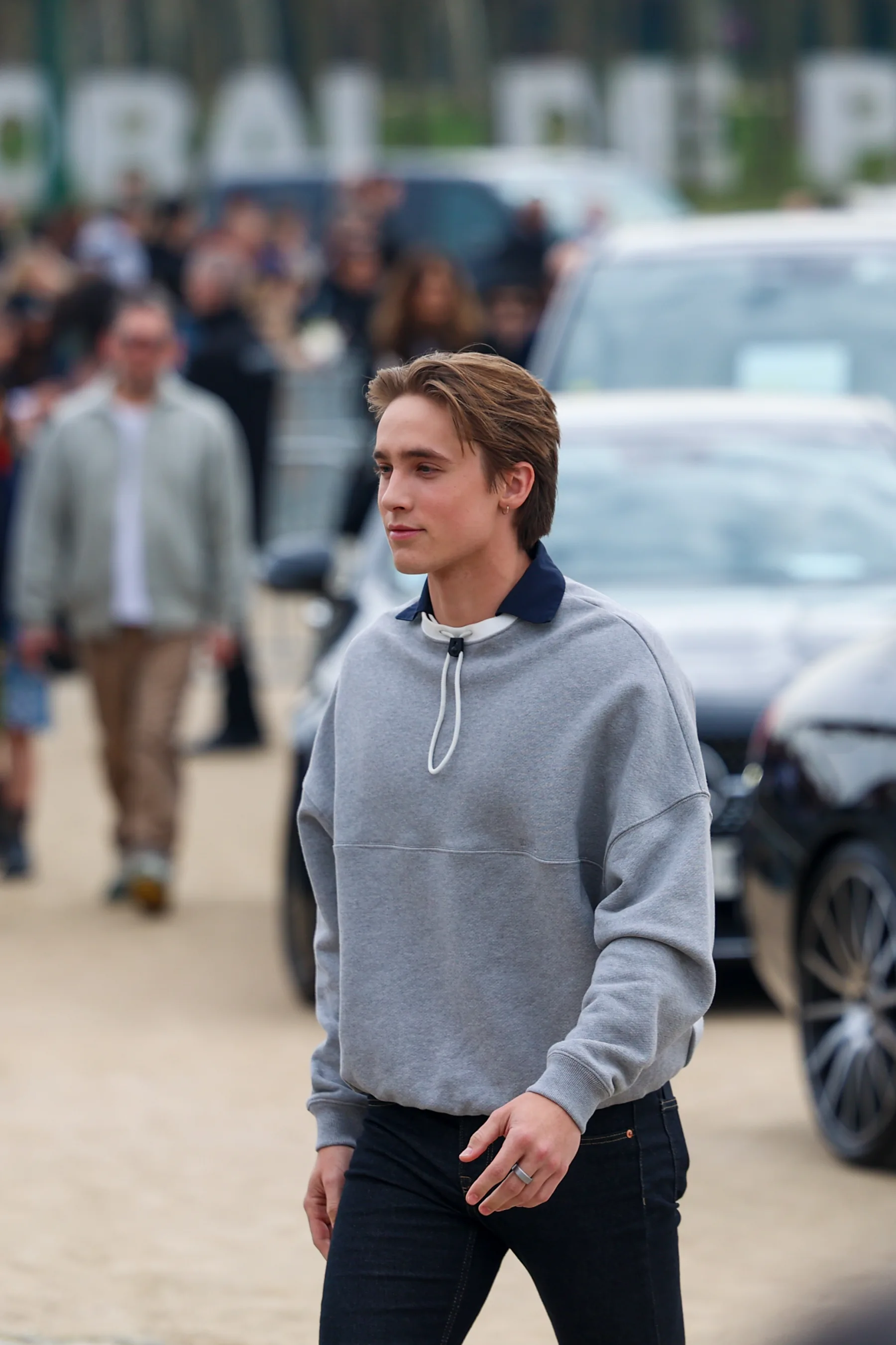 Street-style photograph outside the LOEWE FW26 show during Paris Fashion Week, frame 23 of 34, photographed by Ludovic Delot
