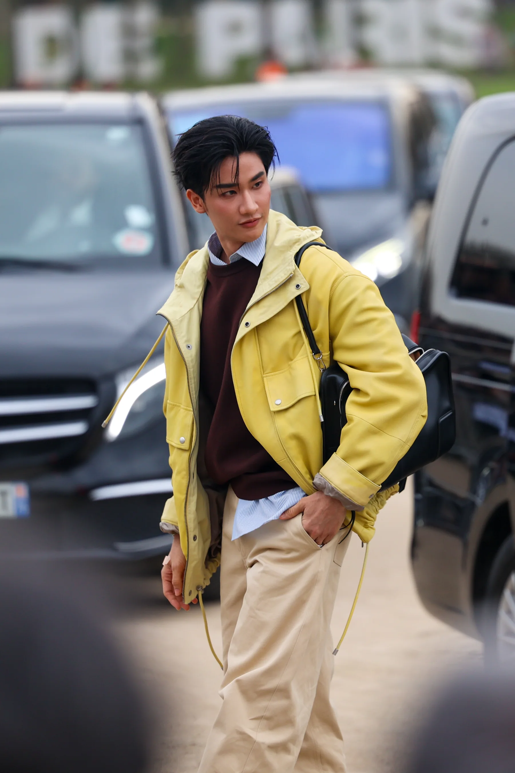 Street-style photograph outside the LOEWE FW26 show during Paris Fashion Week, frame 28 of 34, photographed by Ludovic Delot