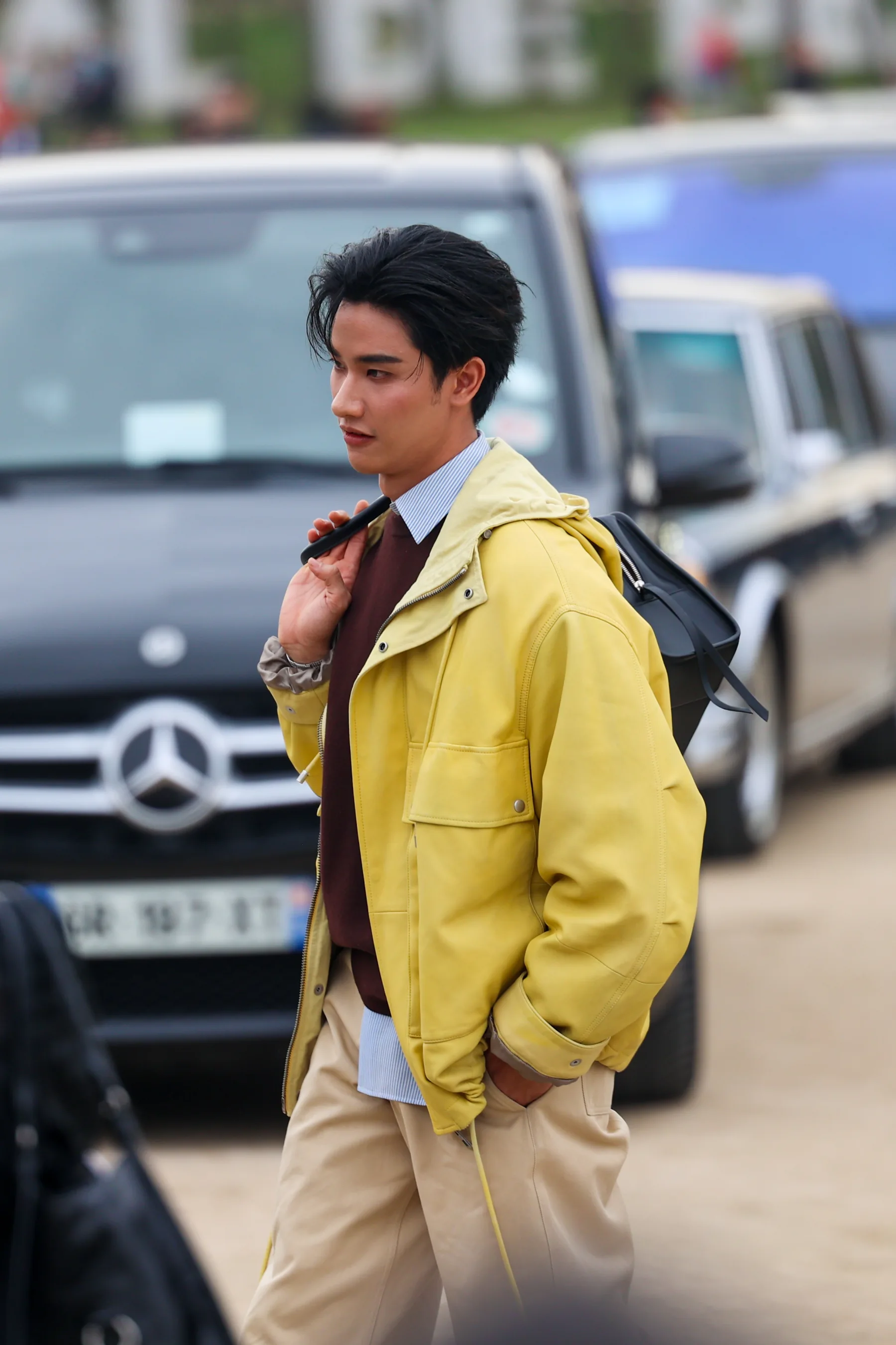 Street-style photograph outside the LOEWE FW26 show during Paris Fashion Week, frame 29 of 34, photographed by Ludovic Delot
