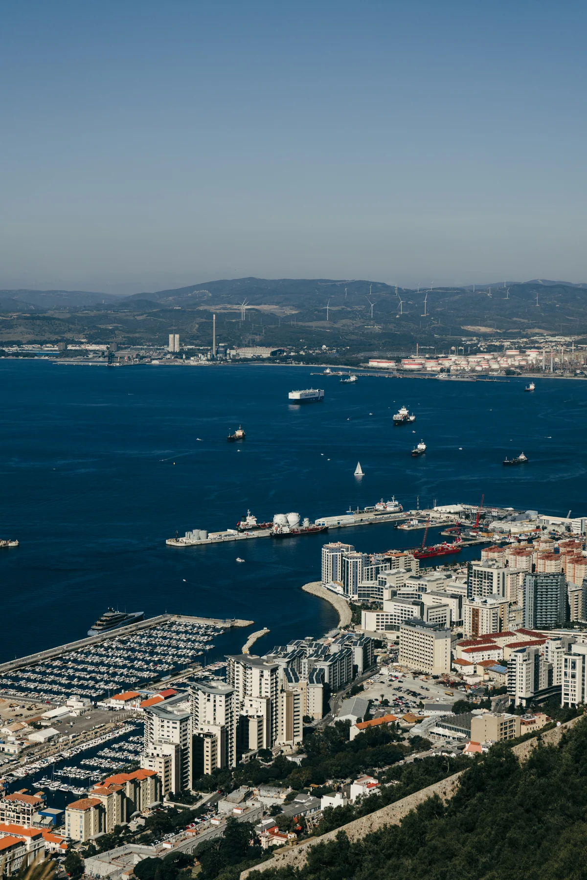 Vertical view over Gibraltar's apartment blocks, marinas and the bay from the Upper Rock.